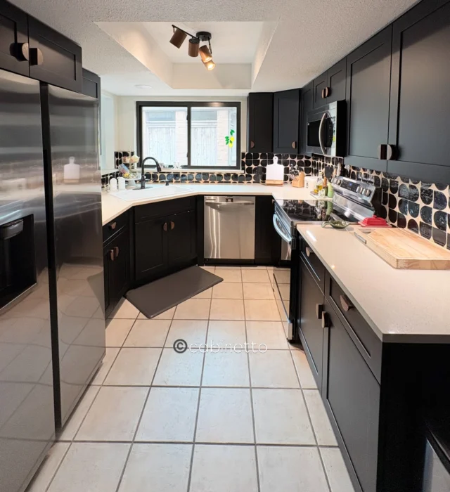 Small but divine ✨
This kitchen transformation proves you don’t need a big space to make a big impact.

From traditional raised panel doors to sleek black shaker cabinets, this space is now the perfect blend of modern contemporary style and everyday functionality.

Our client absolutely nailed every selection 👏
We just helped bring it all together.

Design & cabinets: Cabinetto- RTA Ebony shaker
Countertops: Fabrication team- @brzgraniteandquartz 
Material:  @arizonatile – Gemstone Beige
Tile: @auscraft.construction