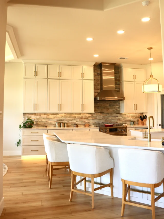 A minimal contemporary kitchen designed to feel warm, clean, and effortlessly timeless. ✨

Featuring @fabuwood Galaxy in Dove, intentionally color-matched walls, sleek stainless steel appliances, built-in microwave, and beautiful @stratussurfaces Quartz countertops. Every detail was designed with both style and function in mind; including a thoughtfully organized spice rack that keeps everyday essentials within easy reach.

Warm, modern, and minimal… exactly what this space needed. ✨