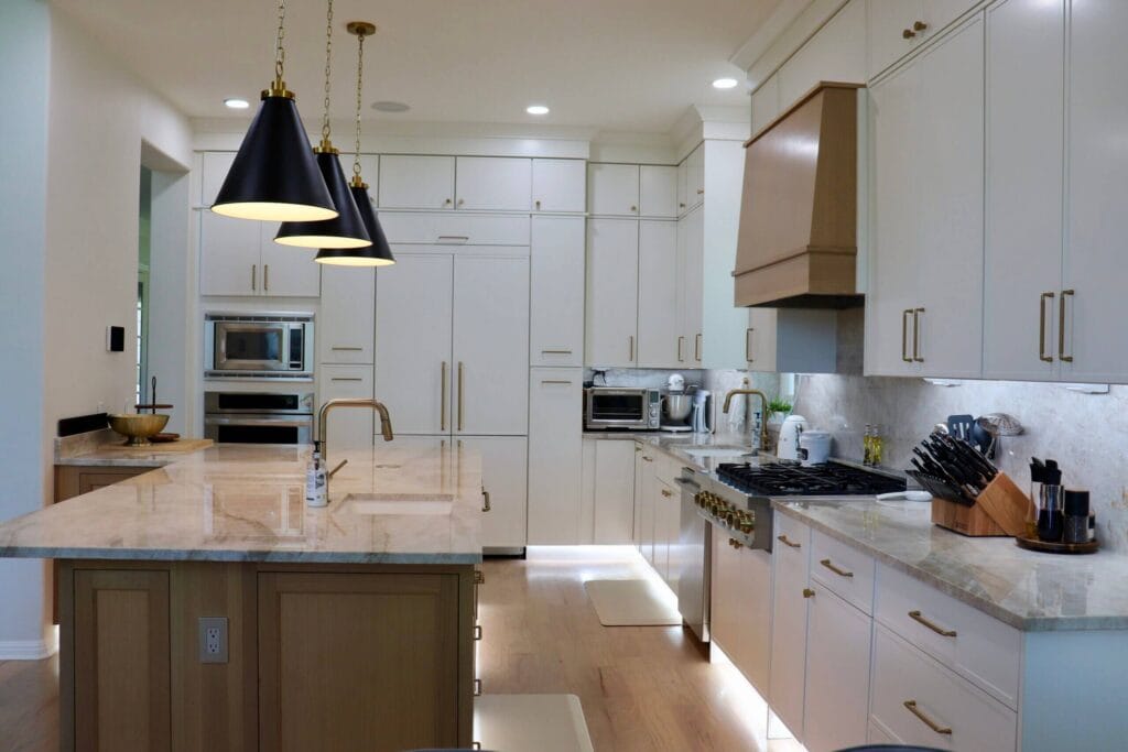 Durasupreme White Oak island, Fabuwood Dove on the perimeter, Taj Mahal quartzite countertops
