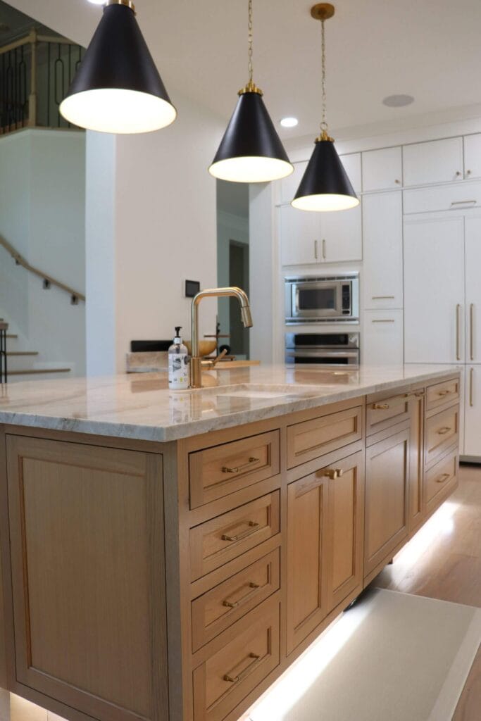 Durasupreme White Oak island, Fabuwood Dove on the perimeter, Taj Mahal quartzite countertops