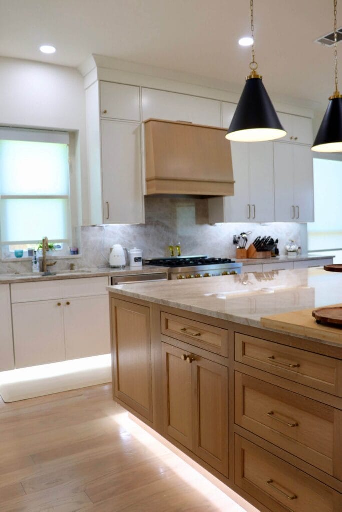 Durasupreme White Oak island, Fabuwood Dove on the perimeter, Taj Mahal quartzite countertops