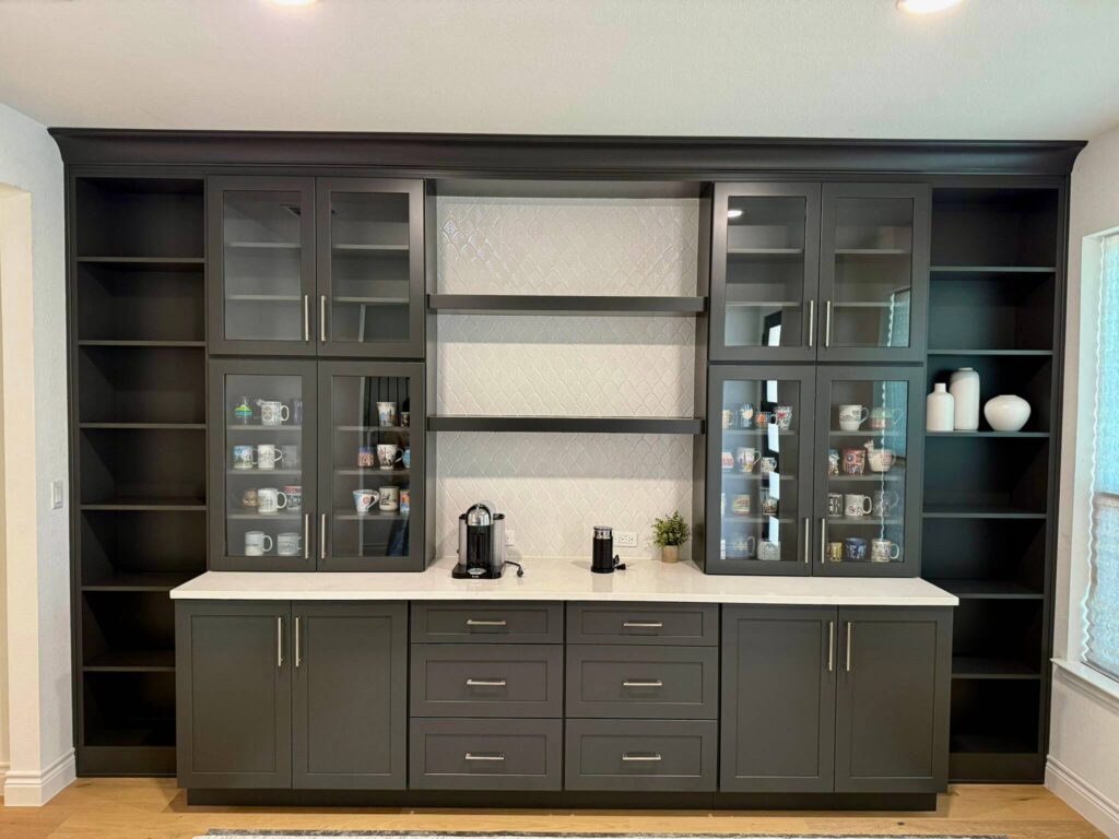 Fabuwood Graphite Galaxy on the main kitchen run, Durasupreme Black Paint on select pieces