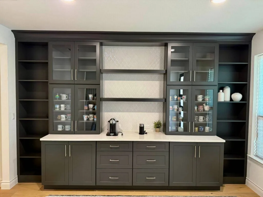 Fabuwood Graphite Galaxy on the main kitchen run, Durasupreme Black Paint on select pieces