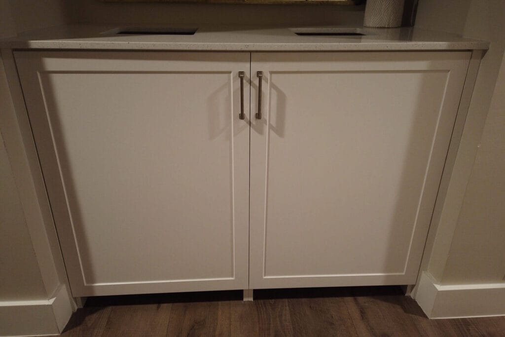 White melamine frameless cabinetry throughout