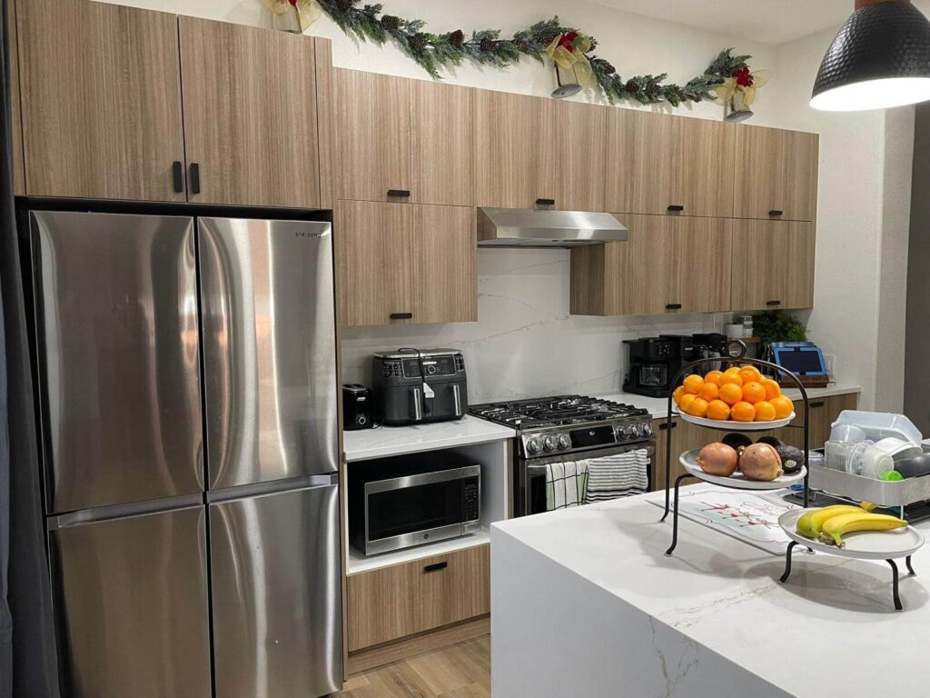 Kitchen Remodeling Frameless cabinetry in Walnut Light finish