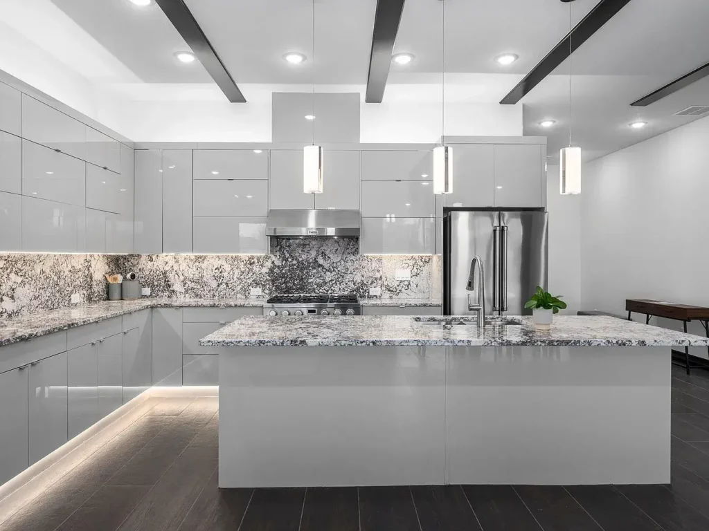 Frameless cabinetry in white glossy finish