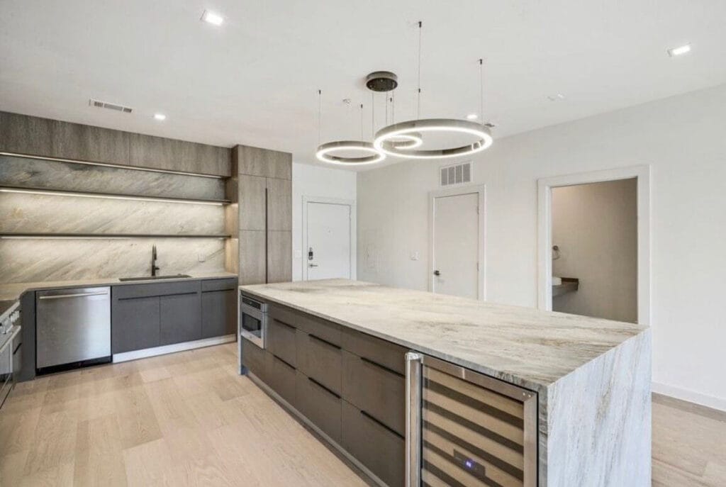 Frameless cabinetry in Salt Oak finish.