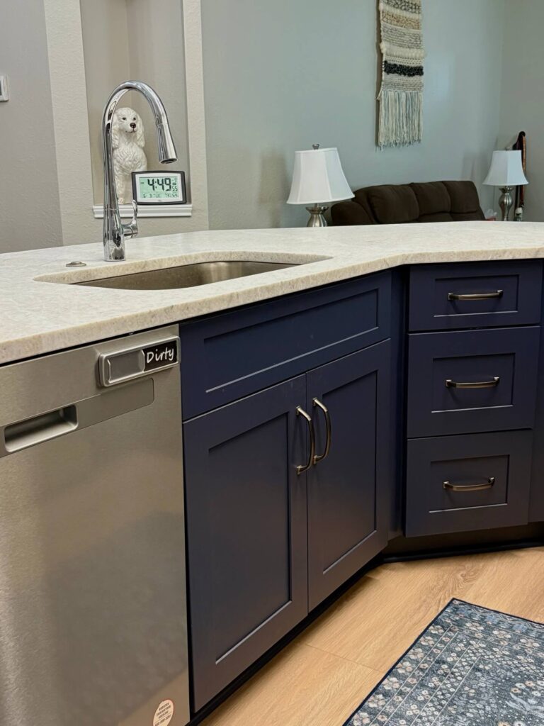 RTA Blue Shaker base cabinets, RTA White Shaker uppers in the kitchen