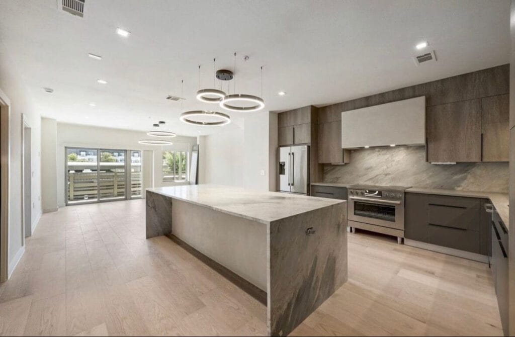 Frameless cabinetry in Salt Oak finish.
