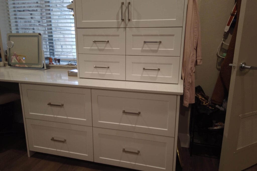 White melamine frameless cabinetry throughout