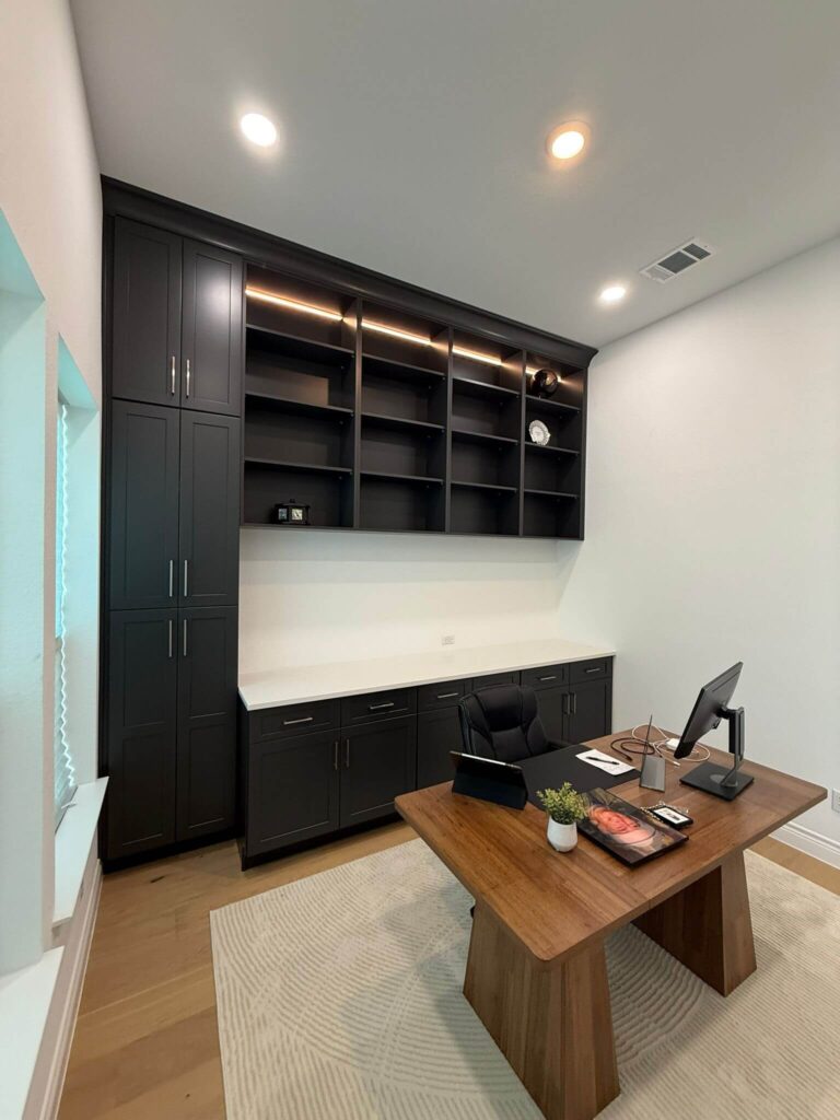 Fabuwood Graphite Galaxy on the main kitchen run, Durasupreme Black Paint on select pieces