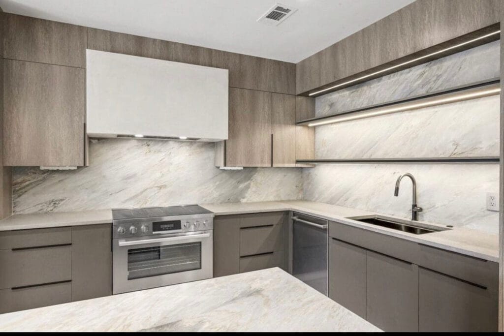 Frameless cabinetry in Salt Oak finish.