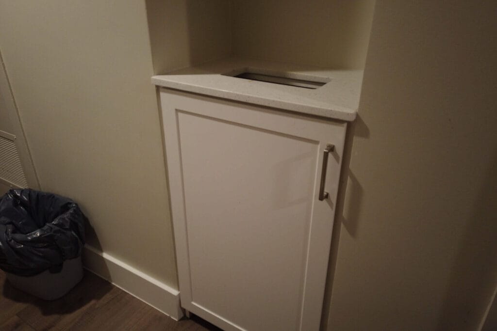 White melamine frameless cabinetry throughout