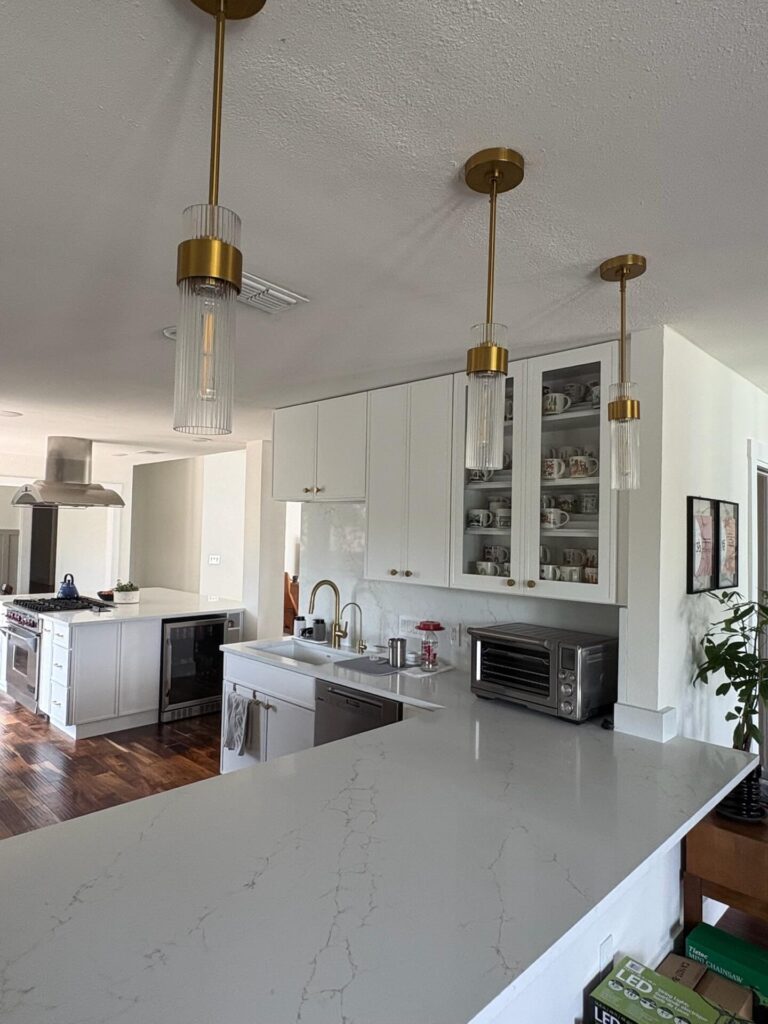 RTA Slim White Shaker cabinets with Stratus Lenox Oro countertops.