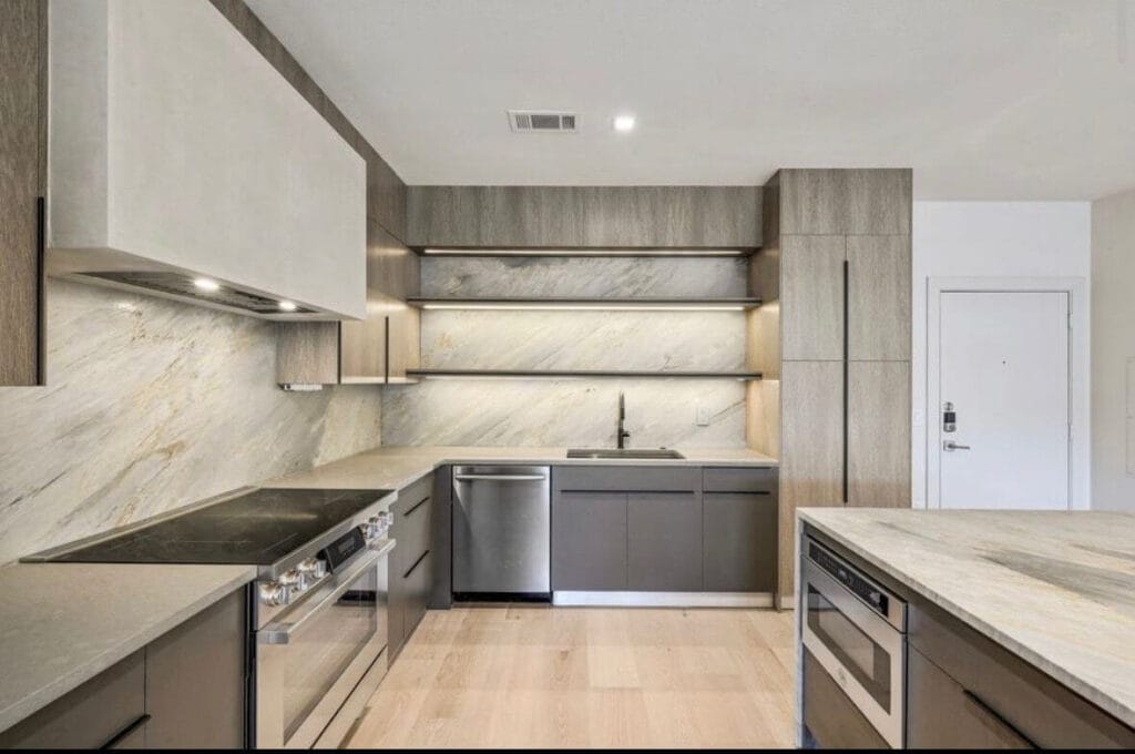 Frameless cabinetry in Salt Oak finish.