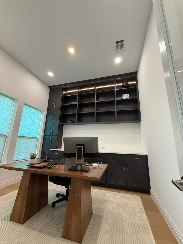 Fabuwood Graphite Galaxy on the main kitchen run, Durasupreme Black Paint on select pieces