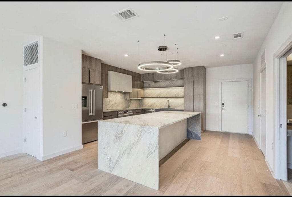 Frameless cabinetry in Salt Oak finish.