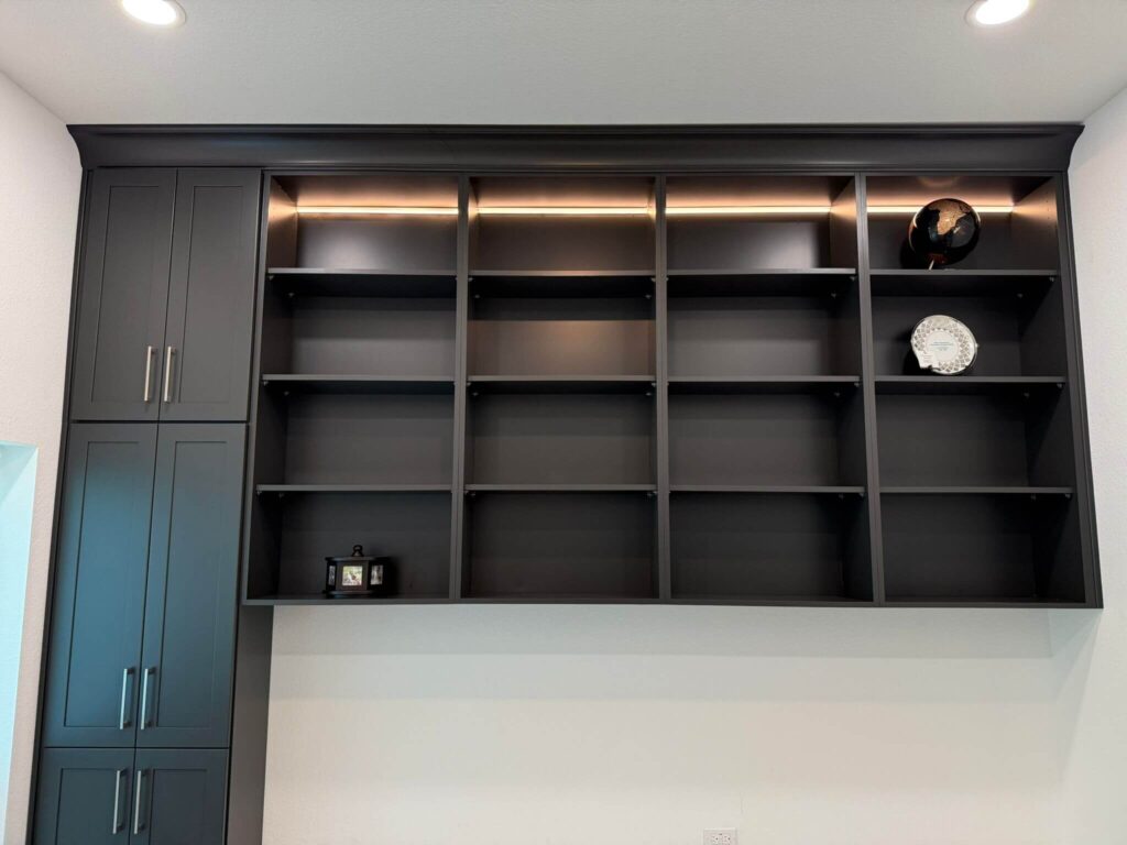 Fabuwood Graphite Galaxy on the main kitchen run, Durasupreme Black Paint on select pieces