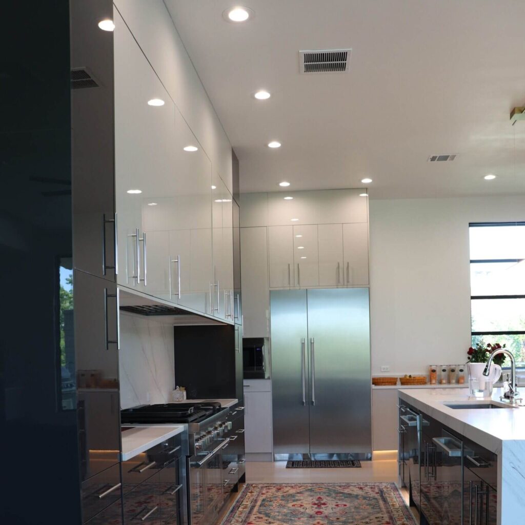 High gloss frameless cabinets in Anthracita and Cashmere kitchen remodeling West Lake Hills