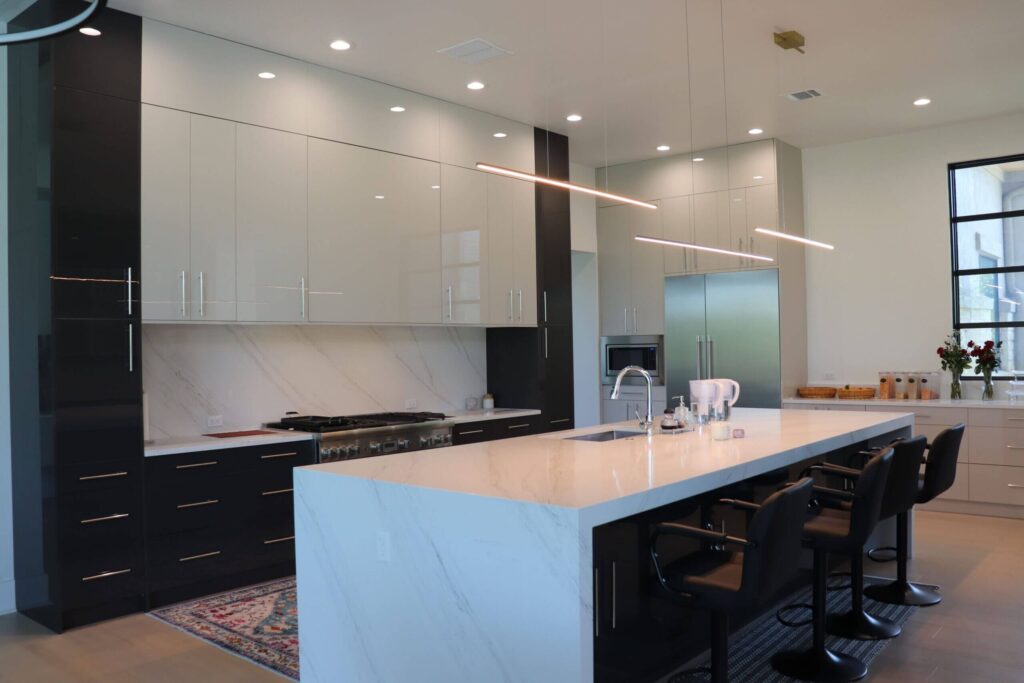 High gloss frameless cabinets in Anthracita and Cashmere kitchen remodeling West Lake Hills