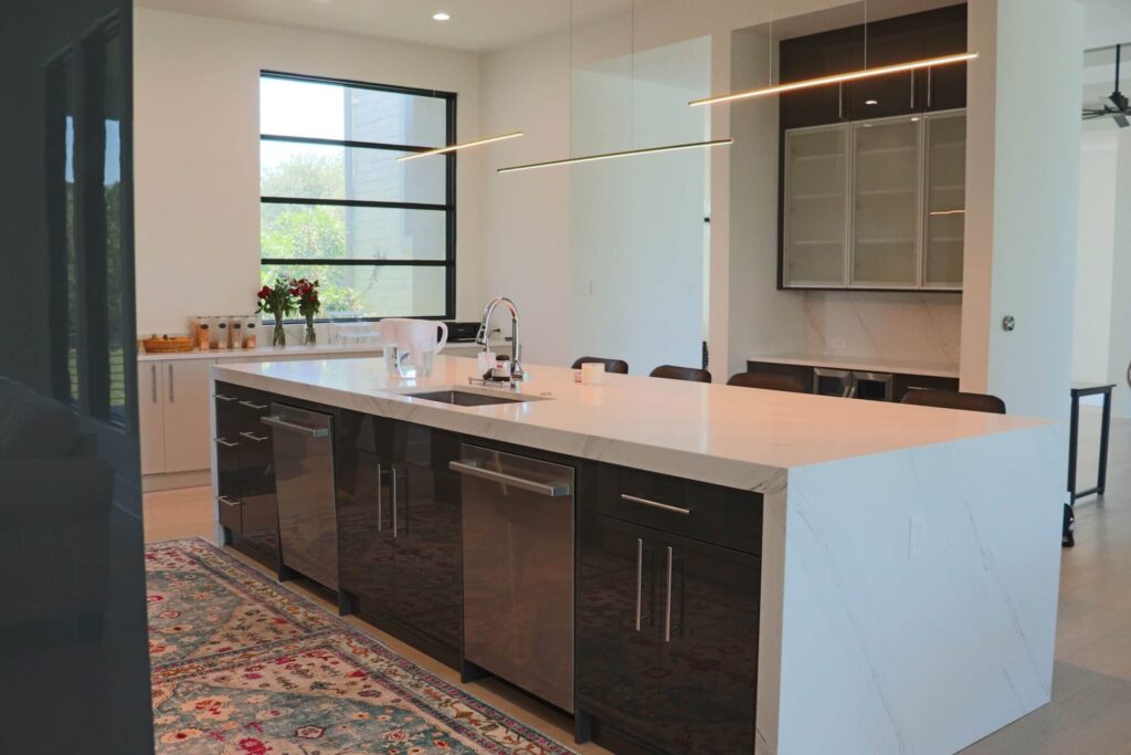 High gloss frameless cabinets in Anthracita and Cashmere kitchen remodeling West Lake Hills