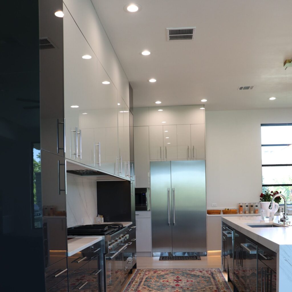 High gloss frameless cabinets in Anthracita and Cashmere kitchen remodeling West Lake Hills